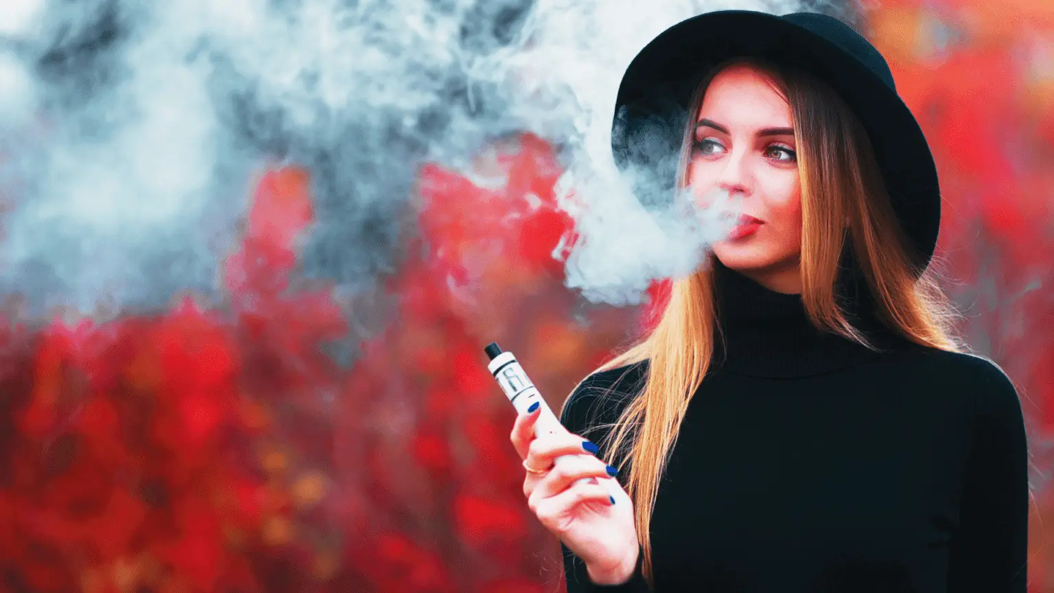 Girl smoking vape from vapedaddy distributors